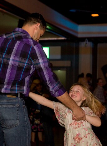 Dads, daughters saddle up to dance night away