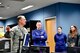 Lt. Col. Brian Bergren, 225th Air Defense Squadron director of operations, discusses lessons learned from Hurricane Harvey recovery efforts with Capt. Sean Cross, U.S. Coast Guard 13th District chief of incident management, and Lt. Cmdr. Brook Serbu, U.S. Coast Guard 13th District command center chief.