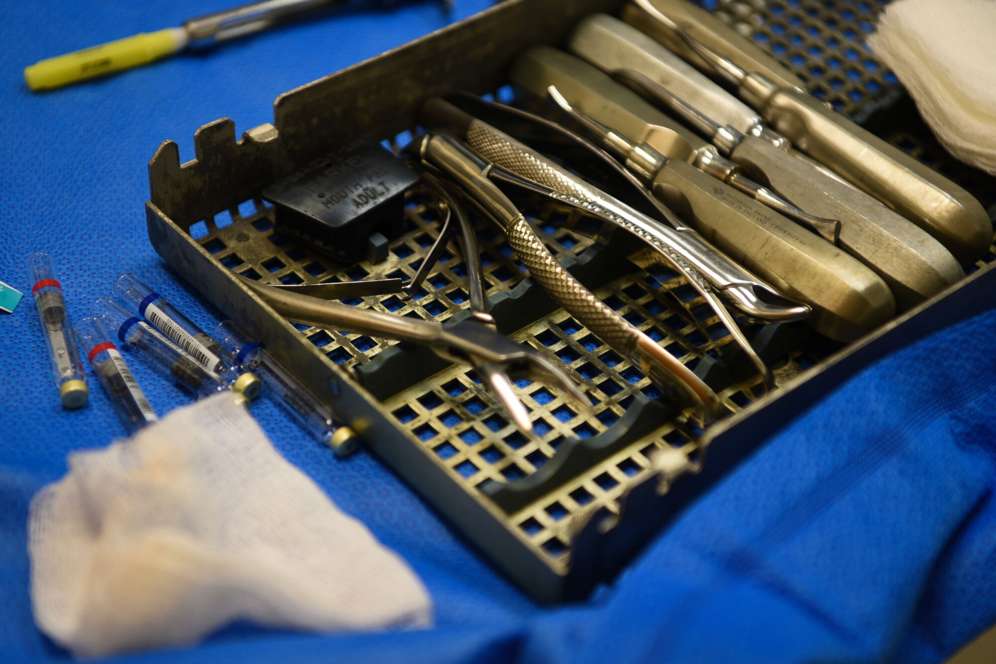 Dental tools are displayed in preparation for the dental surgeon to replace a tooth crown at the dental clinic on F.E. Warren Air Force Base, Wyo., Jan. 16, 2018. The various tools are prepared by the dental assistant before every surgery and are laid out according to the appointment needs. (U.S. Air Force photo by Airman 1st Class Abbigayle Wagner)