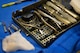 Dental tools are displayed in preparation for the dental surgeon to replace a tooth crown at the dental clinic on F.E. Warren Air Force Base, Wyo., Jan. 16, 2018. The various tools are prepared by the dental assistant before every surgery and are laid out according to the appointment needs. (U.S. Air Force photo by Airman 1st Class Abbigayle Wagner)
