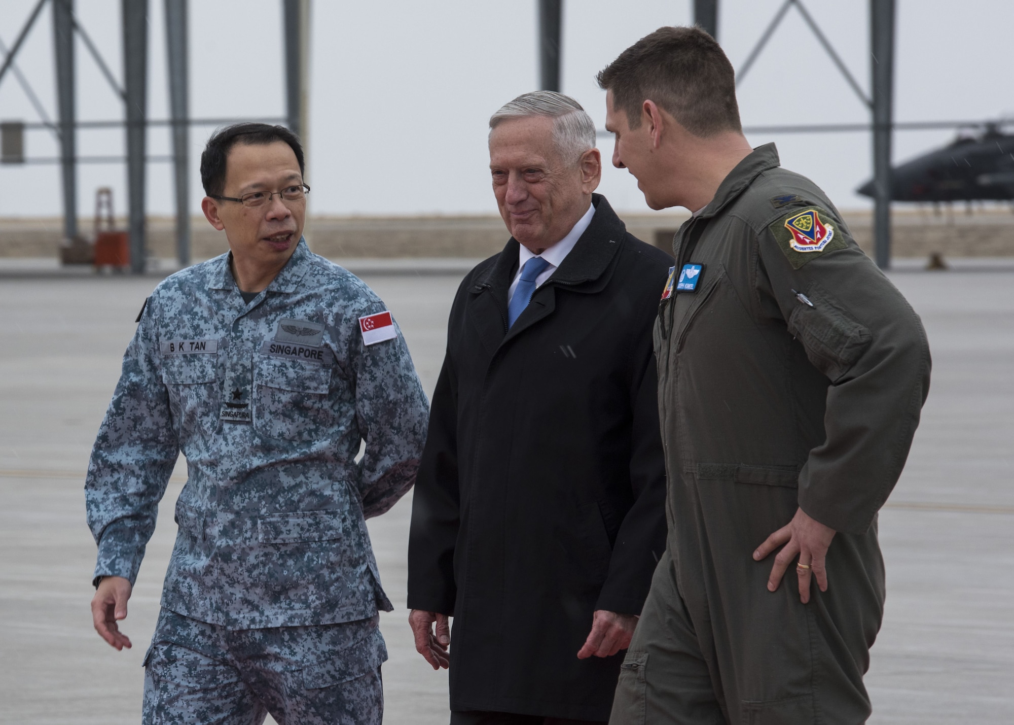 Defense Secretary James N. Mattis walks with Col. Joseph Kunkel, 366th Fighter Wing commander, and Brig. Gen. Boon-Kim Tan, Republic of Singapore defense attaché, after arriving to Mountain Home Air Force Base, Idaho, Jan. 16, 2018. Mattis' visit included a meeting with base leadership and a town hall where he answered Airmen's questions.