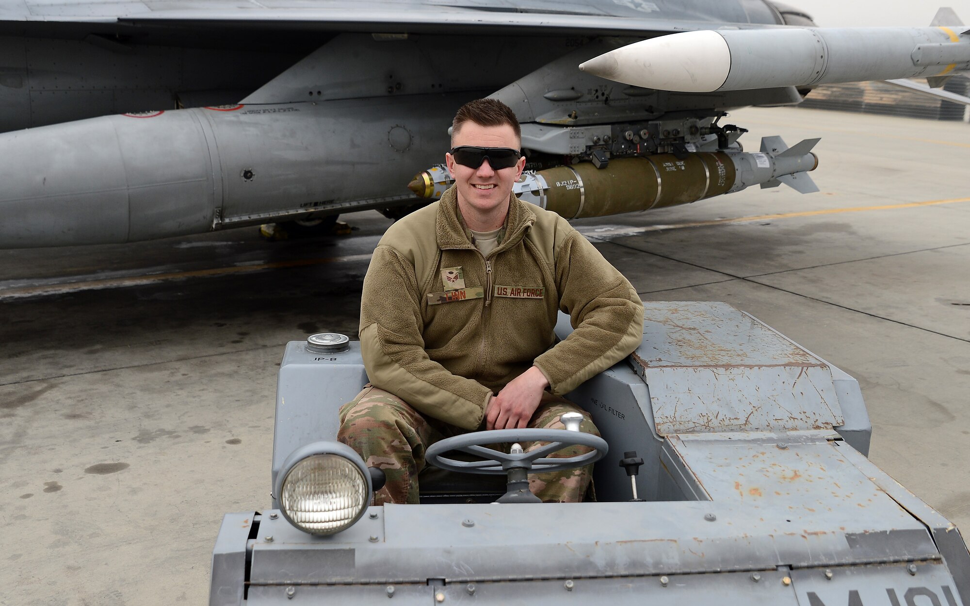 Senior Airman Kaleb Linn, 455th Expeditionary Aircraft Maintenance Squadron weapons load crew member, poses for a photo Jan. 4, 2018 at Bagram Airfield, Afghanistan.