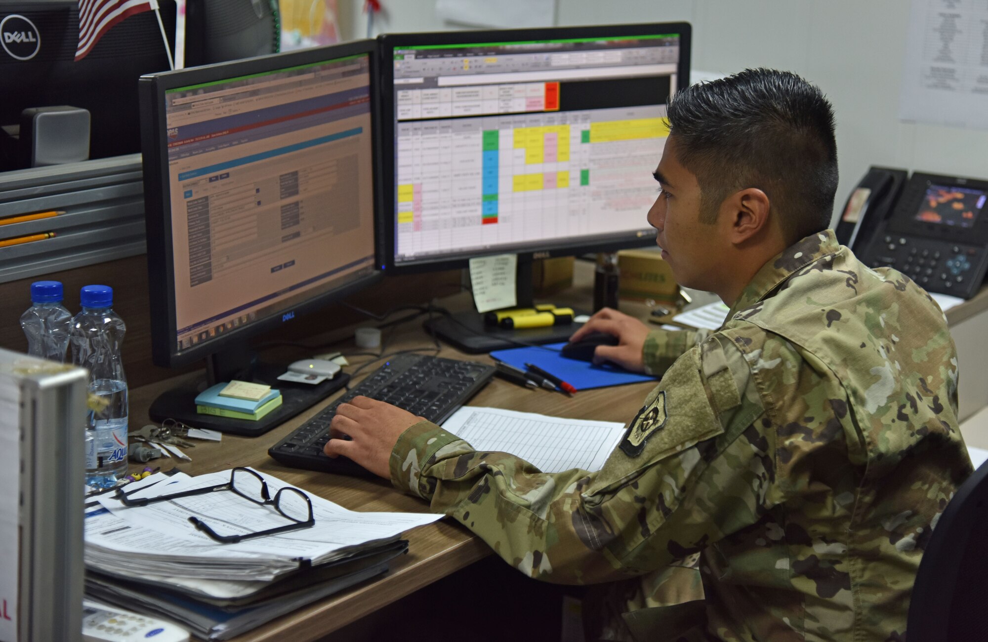 U.S. Air Force Senior Airman Earl Hernandez, 407th Expeditionary Logistics Readiness Squadron Vehicle Management fleet controller, enters information into the Defense Property Accountability System at the 407th Air Expeditionary Group in Southwest Asia, Dec. 18, 2017. Hernandez and the Fleet Management section of the 407th ELRS are responsible for tracking all of the 407th AEG’s government owned and leased vehicles. (U.S. Air Force photo by Staff Sgt. Joshua Edwards/Released)