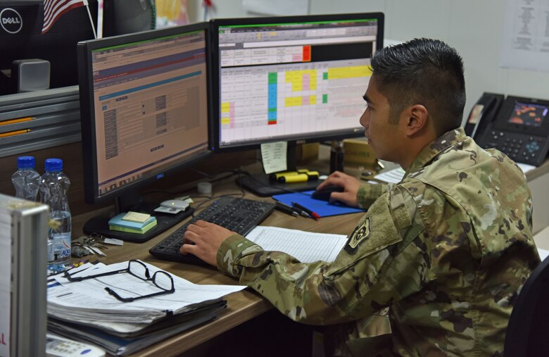 U.S. Air Force Senior Airman Earl Hernandez, 407th Expeditionary Logistics Readiness Squadron Vehicle Management fleet controller, enters information into the Defense Property Accountability System at the 407th Air Expeditionary Group in Southwest Asia, Dec. 18, 2017. Hernandez and the Fleet Management section of the 407th ELRS are responsible for tracking all of the 407th AEG’s government owned and leased vehicles. (U.S. Air Force photo by Staff Sgt. Joshua Edwards/Released)