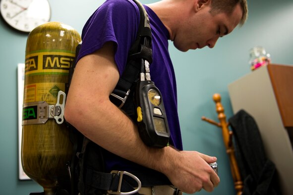 2nd Lt. Eric Olson, 23d Aerospace Medicine Squadron (AMDS) bioenvironmental engineer, secures a breathing apparatus during biohazard readiness training, Jan. 12, 2018, at Moody Air Force Base, Ga. The Bioenvironmental Engineering Flight tested their response capabilities in a simulated contamination scenario. Bioenvironmental engineering specialists focus on reducing health hazards in the workplace and surrounding areas. (U.S. Air Force photo by Airman 1st Class Erick Requadt)