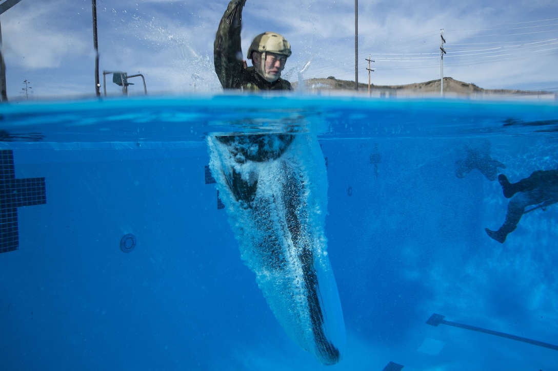 Soldiers with the Japanese Ground Self-Defense Force conduct Marine Corps intermediate swim qualifications as part of Exercise Iron Fist 2018 at Marine Corps Base Camp Pendleton, California, Jan.16, 2018. Exercise Iron Fist brings together U.S. Marines from the 11th Marine Expeditionary Unit and Soldiers from the Japanese Ground Self Defense Force, Western Army Infantry Regiment, to improve bilateral planning, communicating, and the conduct of combined amphibious operations.