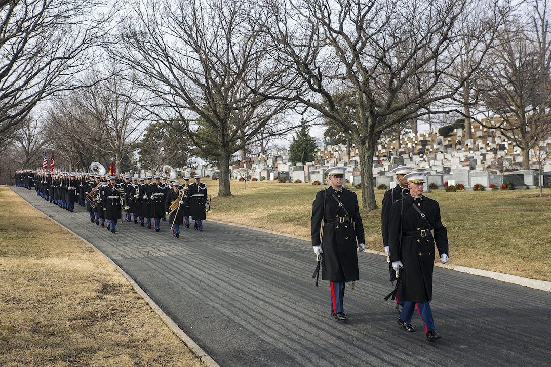 Marines with Marine Barracks Washington D.C. march in formation during a full honors funeral for Maj. Gen. Paul A. Fratarangelo at Arlington National Cemetery, Arlington, Virginia, Jan. 16, 2018.  Fratarangelo served his final active duty assignment as Commander, Marine Corps Air Bases, Western Area.