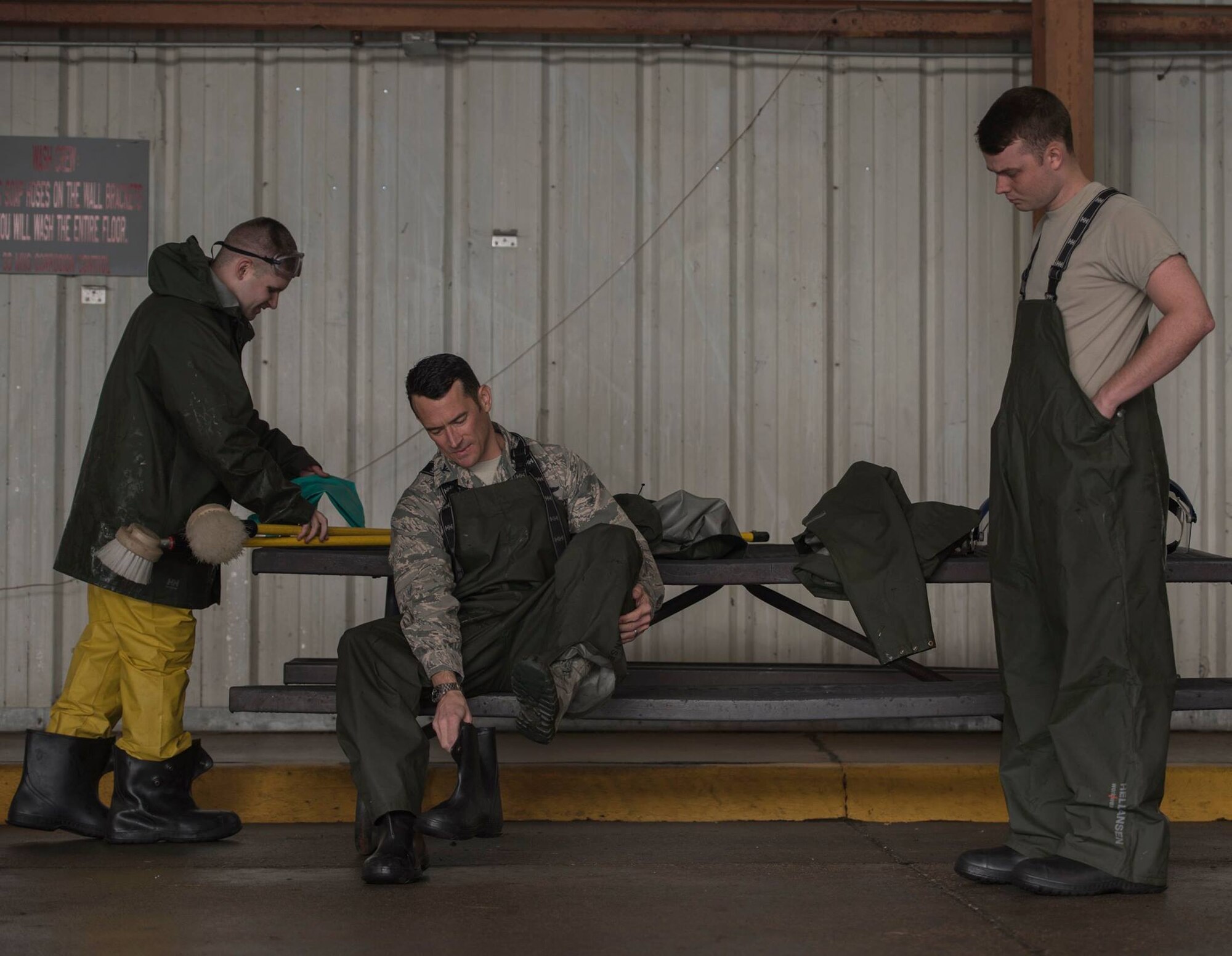 33rd commander helps clean flagship