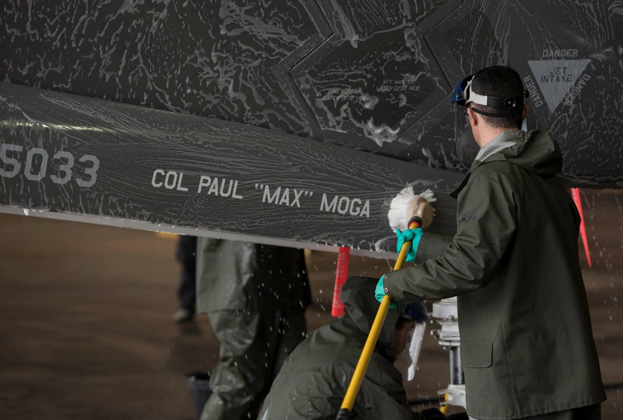 33rd commander helps clean flagship