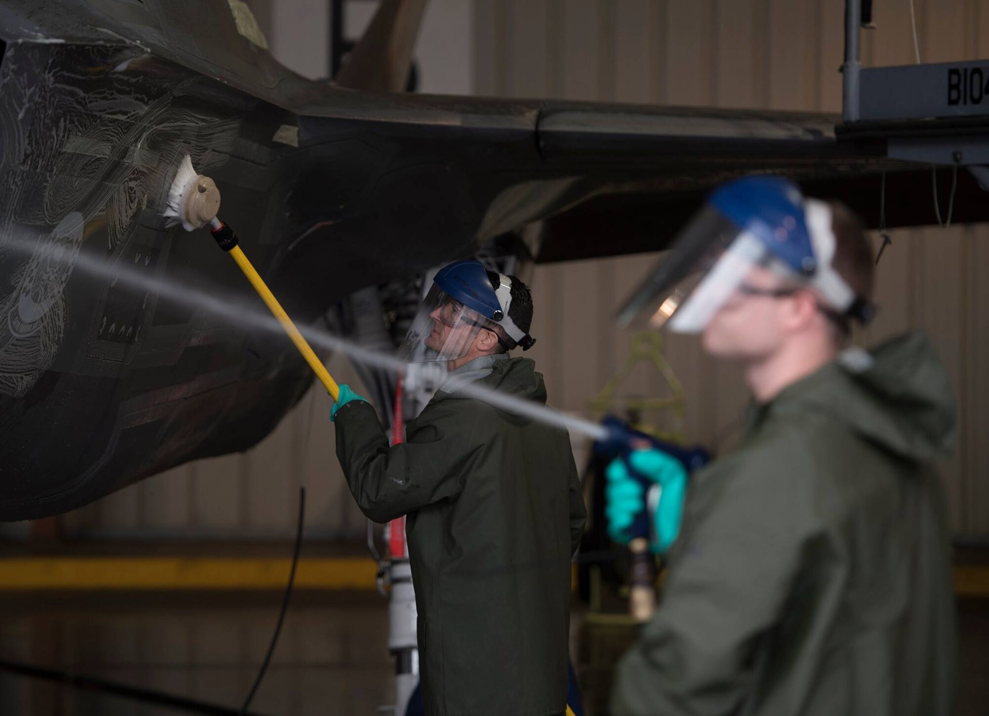 33rd commander helps clean flagship