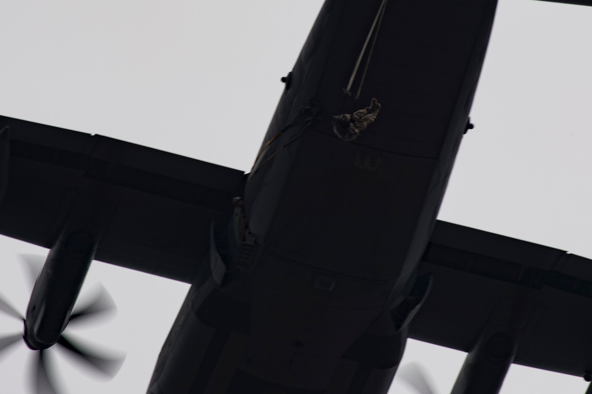 Airmen from the 820th Base Defense Group exit an HC-130J Combat King II during a static-line jump, Jan. 17, 2018, at the Lee Fulp drop zone in Tifton, Ga. The 820th BDG routinely conducts static-line jumps to maintain qualifications and ensure mission readiness. (U.S. Air Force photo by Senior Airman Daniel Snider)