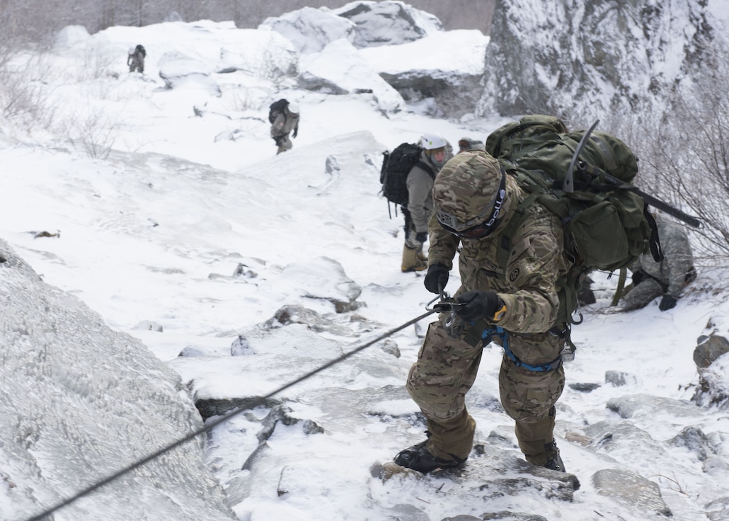 A U.S. Army Soldier climbs the mountain at Smugglers’ Notch.