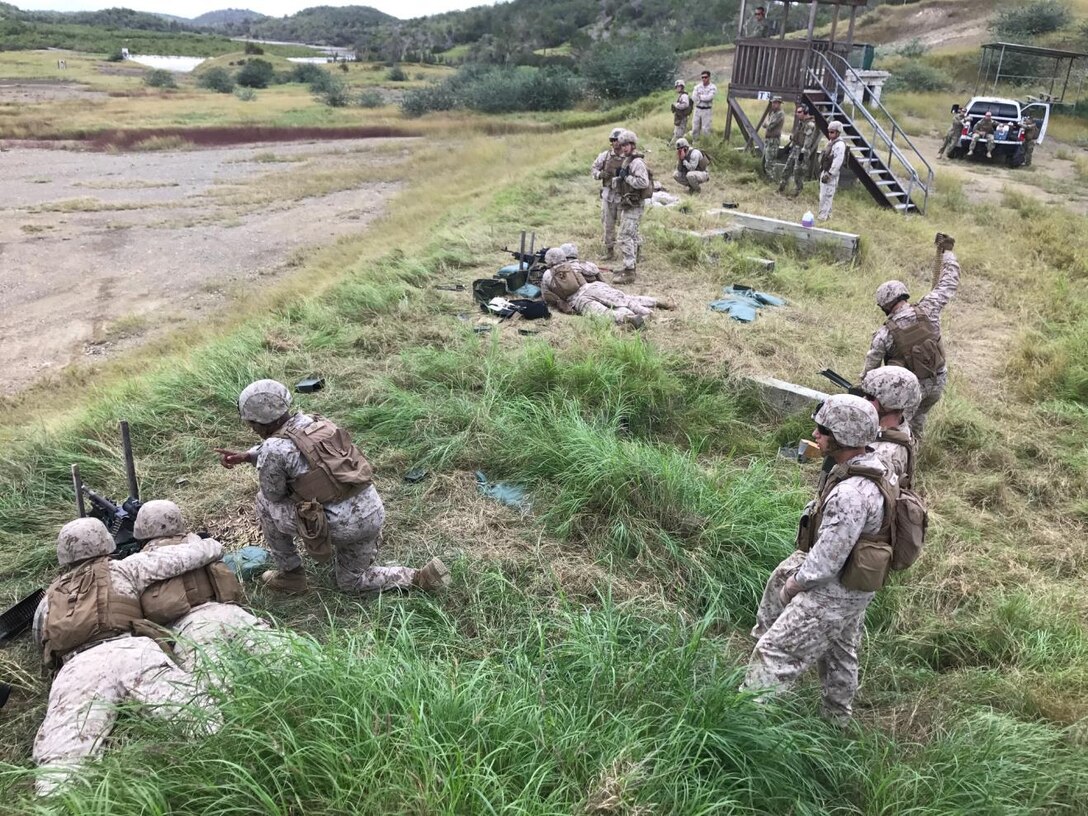 Caption written by Chris Jones
Marines from 5th platoon, Bravo Co., Fleet Anti-terrorism Security Team, U.S. Marine Corps Security Forces Regiment, conduct lane training on the M240B machine gun at Naval Station Guantanamo Bay, Cuba, Jan. 2-3. FAST Marines had an opportunity to shoot from a M192 tripod which provided a sturdier platform to engage targets down range. (Courtesy photo/Released.)