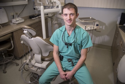 Dr. Jake Williams, Veterans Affairs dentist, poses for a photo January 9, 2017, at Joint Base San Antonio-Randolph.  Williams is the first Veterans Affairs dentist to be assigned to the new office located at the 359th Medical Squadron on JBSA-Randolph.  (U.S. Air Force photo by Sean M. Worrell)