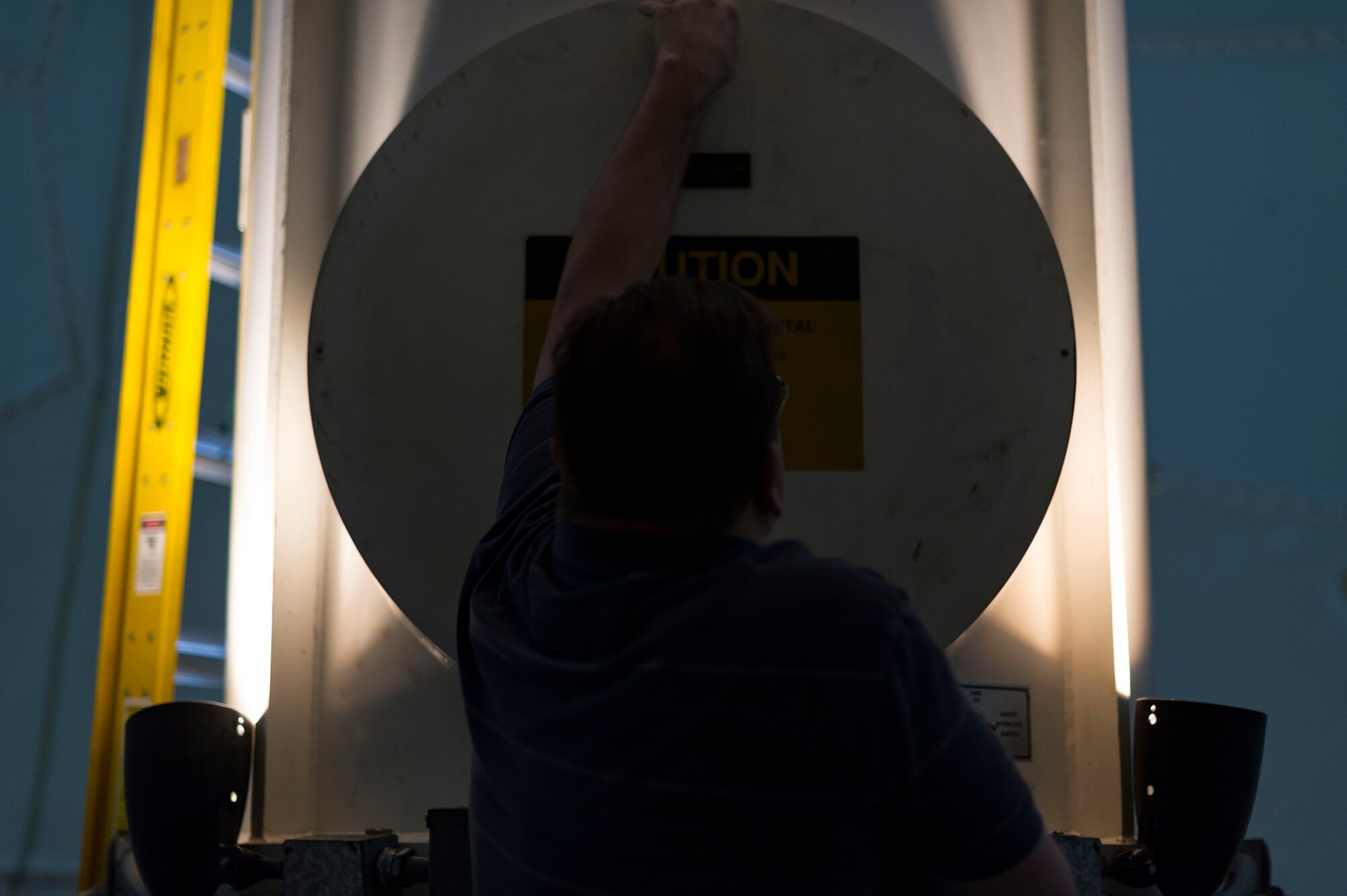 Brock Kerzmann, 47th Operations Support Squadron radar airfield weather systems electronic technician, replaces a cover used by the NexRAD WSR-88D weather radar outside Laughlin Air Force Base, Texas, Jan. 11, 2017. The current upgrade, performed by the RAWS flight jointly with the National Atmospheric Oceanic Administration, are set to improve both the computational power and antennas of the system. (U.S. Air Force photo/Airman 1st Class Daniel Hambor)
