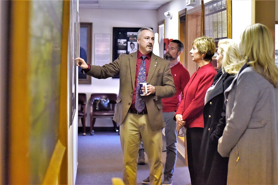 John Turnbow, director of the base museum, guides Laura Hyten (third from left) on a tour during her visit to Malmstrom Air Force Base, Montana, Jan. 17, 2018. Mrs. Hyten is married to U.S. Air Force Gen. John Hyten (not pictured), commander of U.S. Strategic Command (USSTRATCOM). While there, Gen. and Mrs. Hyten met with base leaders and airmen to thank them for their support to USSTRATCOM’s deterrence mission. She also toured facilities at the base, including the resiliency center, maintenance bay and community center. (U.S. Air Force photo by Kiersten McCutchan)