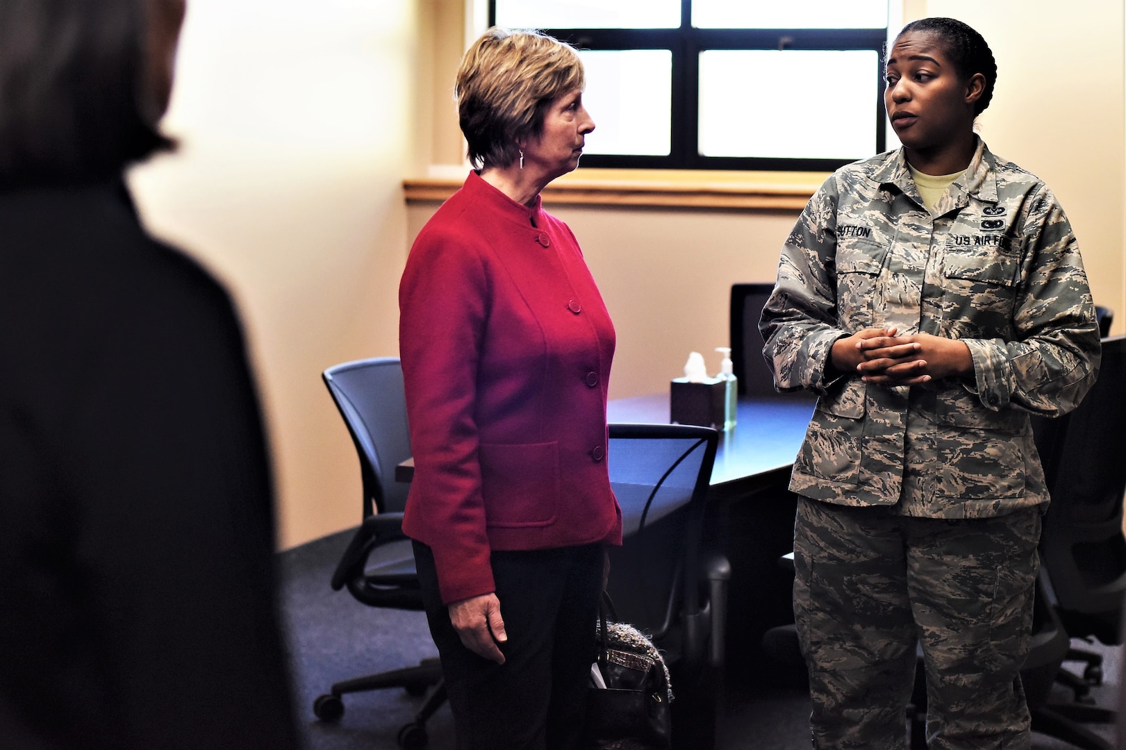 Laura Hyten speaks with Staff Sgt. Jasmine Sutton, 341st Missile Wing special victims counsel paralegal, at the Malmstrom Air Force Base resiliency center in Montana, Jan. 17, 2018. Mrs. Hyten is married to U.S. Air Force Gen. John Hyten (not pictured), commander of U.S. Strategic Command (USSTRATCOM). While there, Gen. and Mrs. Hyten met with base leaders and airmen to thank them for their support to USSTRATCOM’s deterrence mission. She also toured facilities at the base, including the resiliency center, maintenance bay and community center. (U.S. Air Force photo by Kiersten McCutchan)