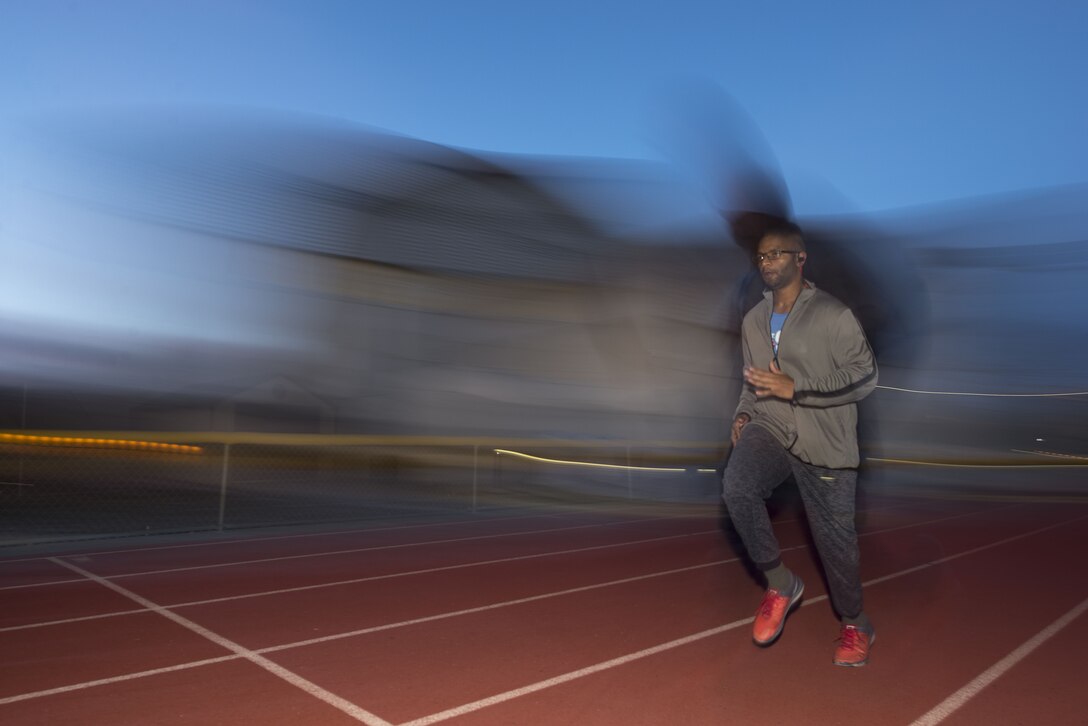 Senior Airman Joseph Amador, 366th Fighter Wing judge advocate military justice paralegal, runs to train for the Slimpossible challenge Jan. 12, 2018, at the Gunfighter Fitness Center, Mountain Home Air Force Base, Idaho. The Slimpossible challenge motivates Gunfighters to maintain good eating habits and structured workouts throughout the event. (U.S. Air Force photo by Airman 1st Class JaNae Capuno)