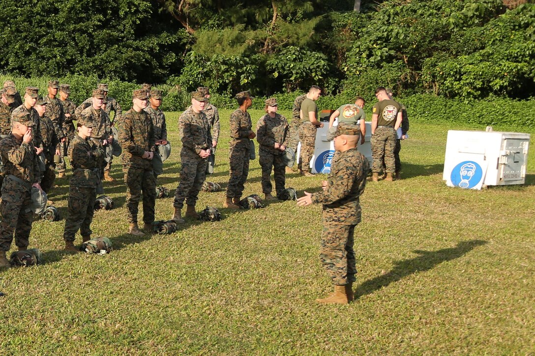 CAMP FOSTER, OKINAWA, Japan – A chemical, biological, radiological, and nuclear defense specialist explains the gas chamber rules Jan. 11 at the gas chamber on Marine Corps Air Station Futenma, Okinawa, Japan.