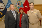 Retired Army Brig. Gen. Clara Adams-Ender (center), is joined by DLA Troop Support Deputy Commander Richard Ellis (left) and NAVSUP Weapons Systems Support Director of Engineering and Product Support Navy Capt. Armen Kurdian (right) following a presentation in honor of Civil Rights leader Dr. Martin Luther King, Jr. Jan. 16 in Philadelphia.