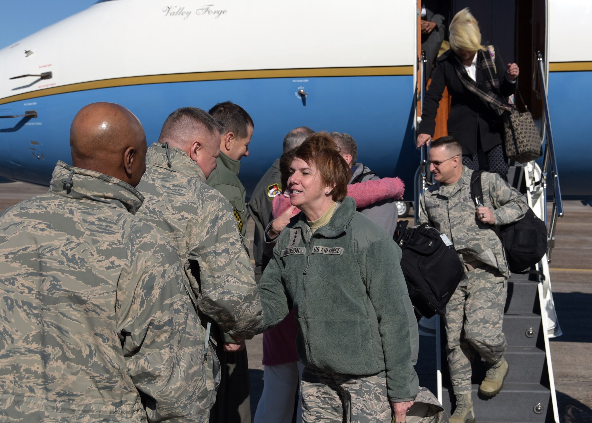 U.S. Air Force Gen. Lori Robinson (center), commander of U.S. Northern Command as well as North American Aerospace Defense Command, is greeted by leadership from both the 325th Fighter Wing and 1st Air Force during Robinson’s arrival to Tyndall Air Force Base, Fla., Jan. 17, 2018. Robinson began her long 35 year career as a graduate of Tyndall’s Air Battle Manager School. (U.S. Air Force photo by Airman 1st Class Isaiah J. Soliz/Released)