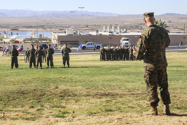 Sgt. Maj. Brian E. Anderson, incoming sergeant major, 1st Battalion, 7th Marine Regiment, Marine Corps Air Ground Combat Center Twentynine Palms, Calif., provides some encouraging words to his new Marines during the post and relief ceremony at the commanding general’s lawn aboard the Combat Center Jan. 11, 2018. During the ceremony Cedeno relinquished his post as sergeant major to Sgt. Maj. Brian E. Anderson, incoming sergeant major, 1/7, MCGACC. (Official Marine Corps photo by Lance Cpl. Margaret Gale)