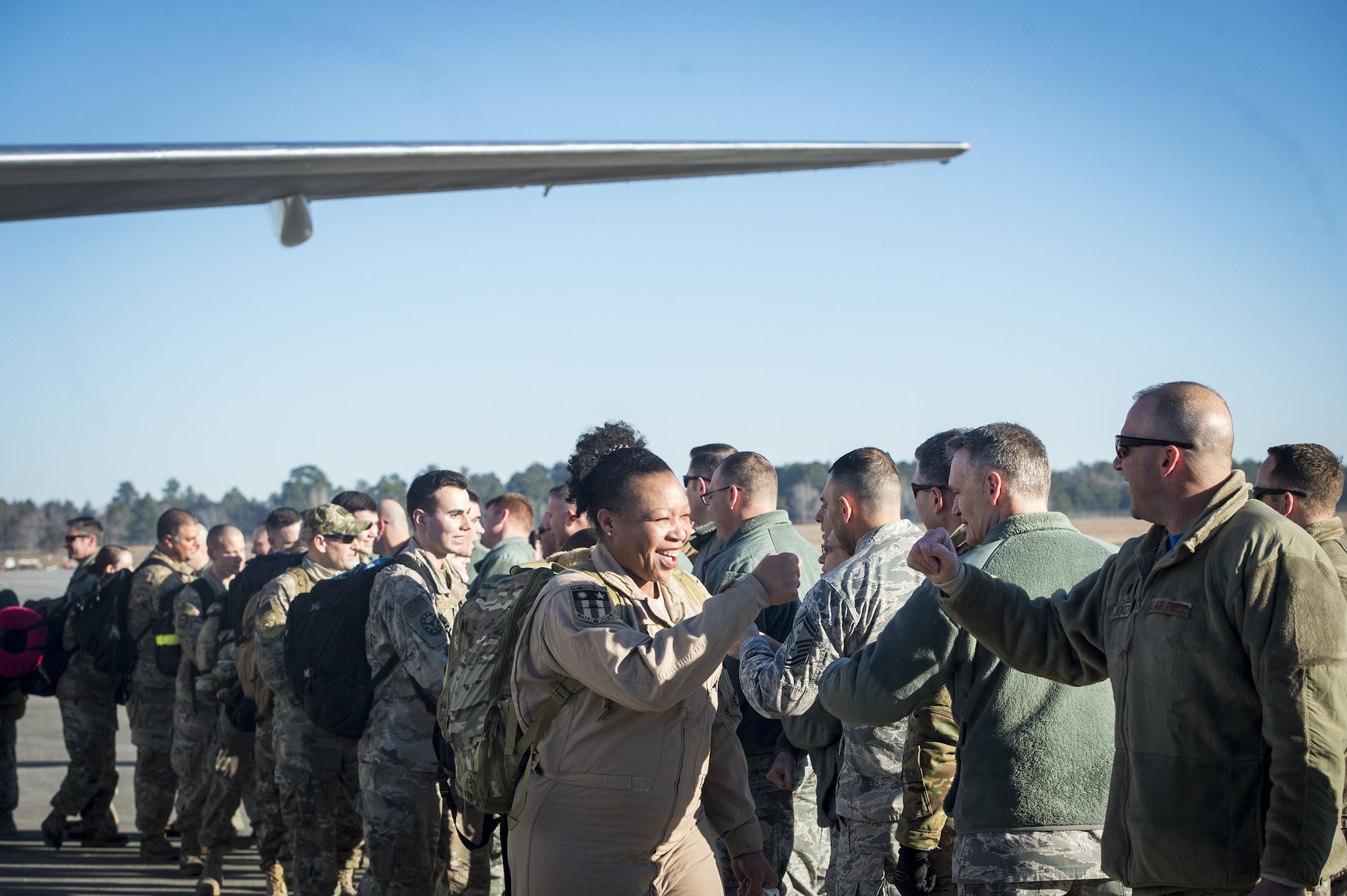 Airmen from the 74th Fighter Squadron (FS) greet base leadership during a redeployment ceremony, Jan. 19, 2018, at Moody Air Force Base, Ga. The 74th FS conducted around-the-clock planning and operations, which have decimated ISIS’ fighting capacity with precise strikes, erasing tens of thousands of fighters from ISIS rosters.