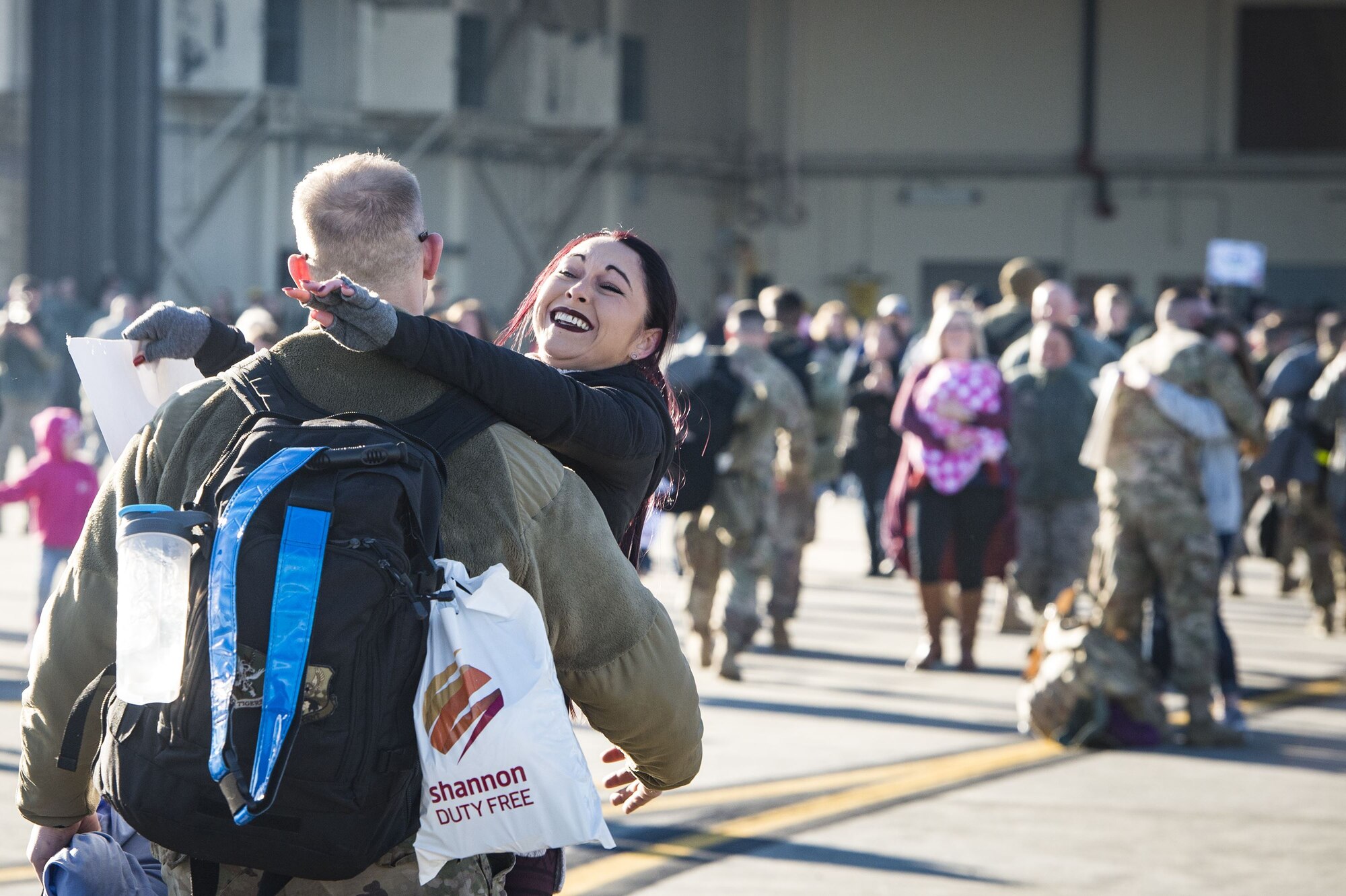 Rachel Hinton, embraces her husband, Staff Sgt. Eric Hinton, 723d Aircraft Maintenance Squadron, during a redeployment ceremony, Jan. 19, 2018, at Moody Air Force Base, Ga. While deployed in support of Operation Inherent Resolve, the 74th FS earned 65 Air Medals, five single-event Air Medals, four Combat Action Medals, and received four Distinguished Flying Cross nominations. (U.S. Air Force photo by Staff Sgt. Ceaira Young)