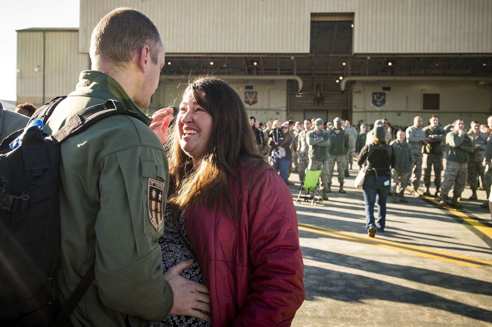 Maj. Matthew “Chowder” Cichowski, 74th Expeditionary Fighter Squadron (EFS) A-10C Thunderbolt II pilot, greets his wife, Sara during a redeployment ceremony, Jan. 19, 2018, at Moody Air Force Base, Ga. During the seven-month deployment, the 74th FS flew more than 1,700 sorties, employed weapons over 4,400 times, destroyed 2,300 targets and killed 2,800 ISIS insurgents. (U.S. Air Force photo by Staff Sgt. Ceaira Young)