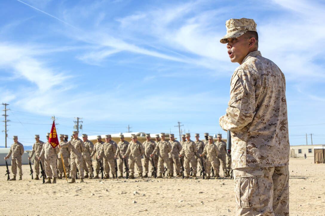 Sgt. Maj. Phillip J. Billiot, 3rd Marine Regiment Sgt. Maj., 3rd Marine Regiment, 3rd Marine Division, gives a speech at post and relief ceremony at Camp Wilson aboard the Marine Corps Air Ground Combat Center, Twentynine Palms, Calif., Jan. 17, 2018. The post and relief ceremony took place during an integrated training exercise that 3rd Marine Division took part in. (U.S. Marine Corps photo by Pfc. Rachel K. Porter)