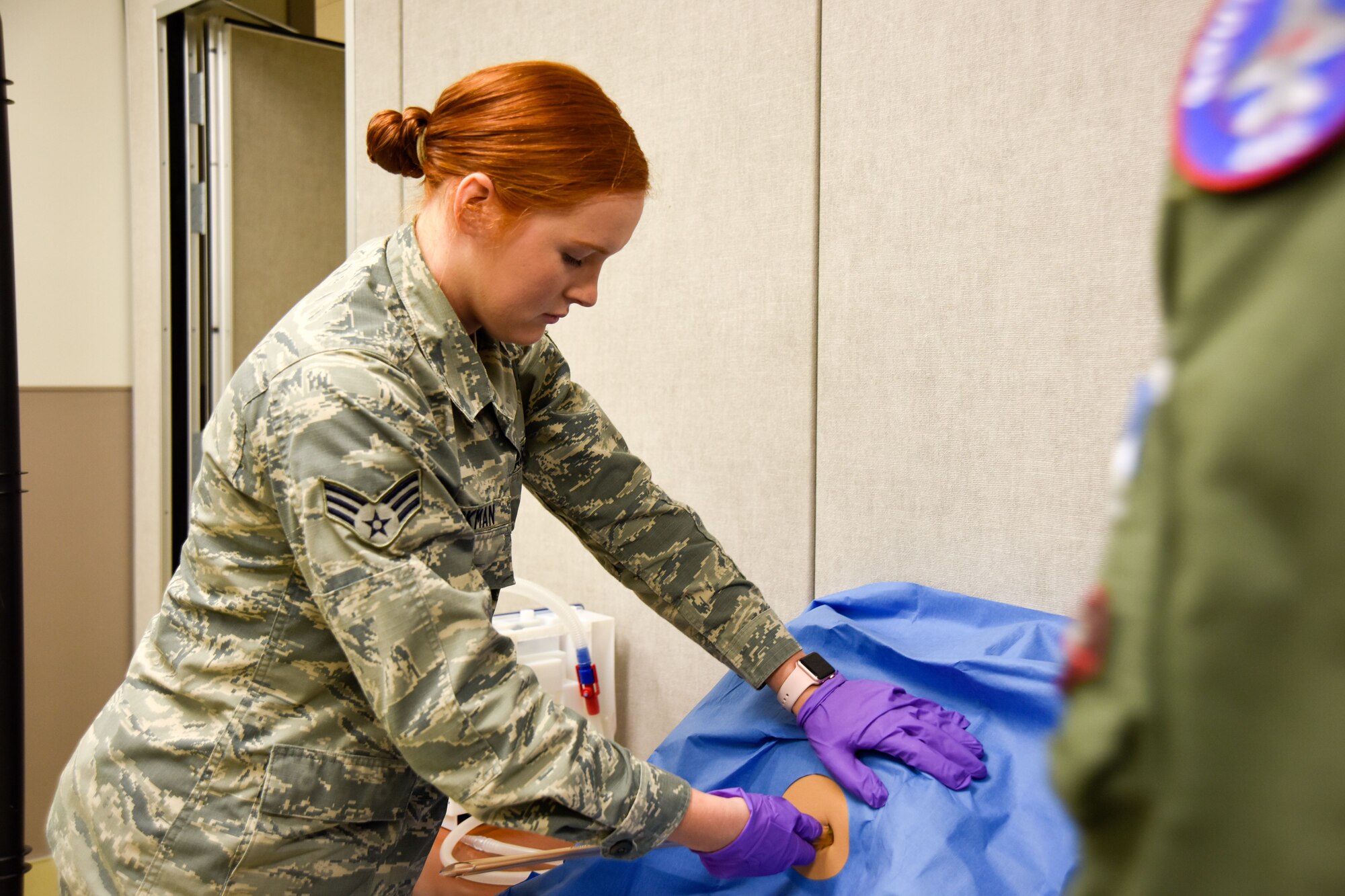 Senior Airmen Ashley Eickman, 114th Medical Group medic, inserts a chest tube on a practice dummy at Tripler Medical Simulation Center, Jan. 12, 2018, Honolulu, HI.