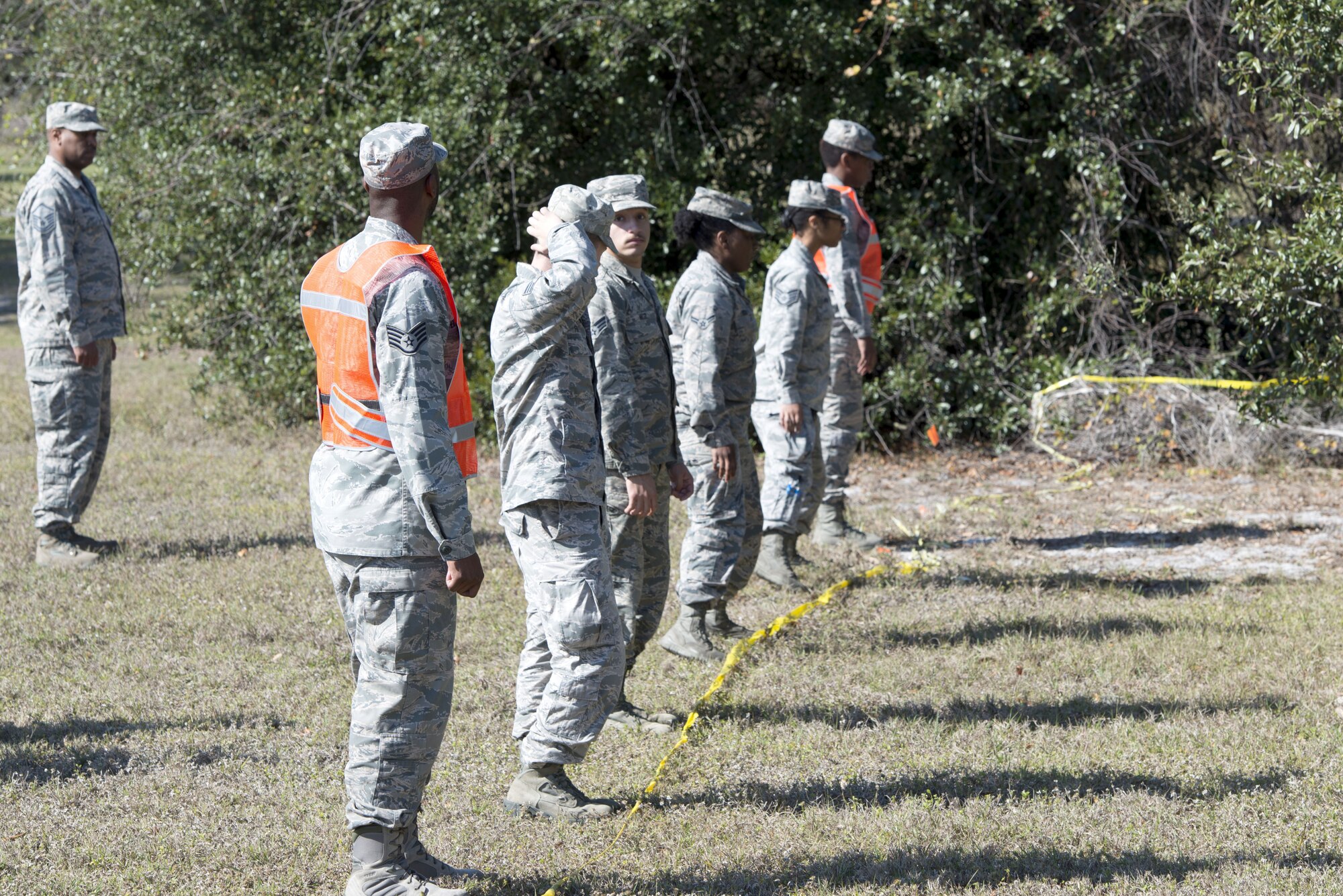 U.S. Air Force Airmen assigned to the 6th Force Support Squadron prepare to step as a group during a search and recovery training exercise Jan. 17, 2018, at MacDill Air Force Base, Fla.