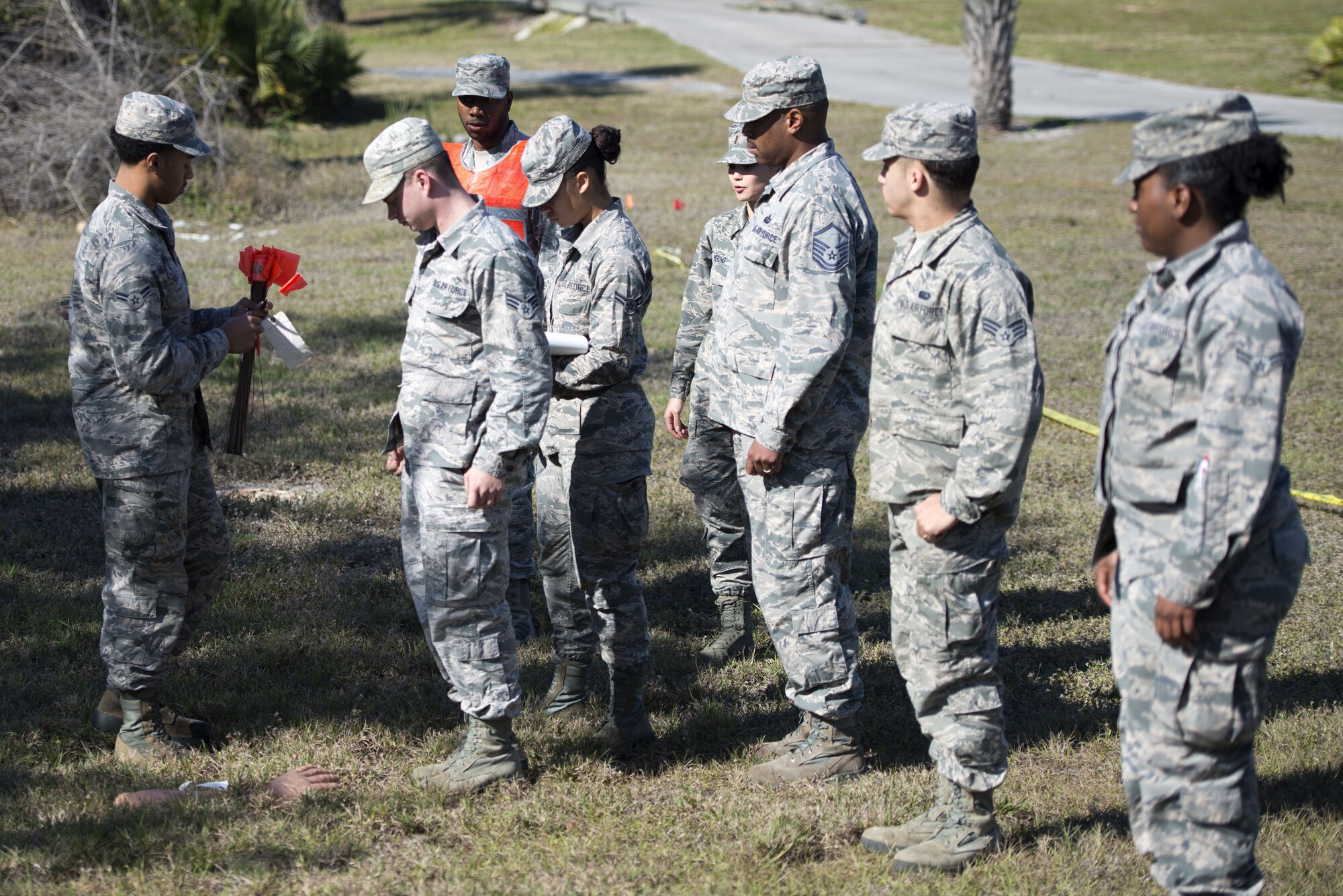 U.S. Air Force Airmen assigned to the 6th Force Support Squadron prepare to mark what they call a “find” during a search and recovery training exercise Jan. 17, 2018, at MacDill Air Force Base, Fla.
