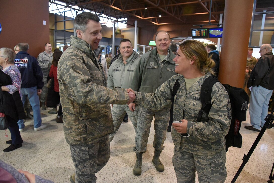 Col. Britt Hatley, the 119th Wing commander, North Dakota Air National Guard, welcomes Airmen home from deployment.