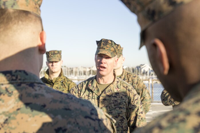 Chief Warrant Officer 3 Christopher Freitag, chief combat cargo operator, LSD 50, instructs Marines from U.S. Marine Corps Forces Command on  loading and unloading cargo aboard the USS Carter Hall (LSD 50) at Joint Expeditionary Base Little Creek, Virginia Beach, Va., Jan. 19. The Marines had the opportunity to explore the ship and learn the basic cargo operations.(Official U.S. Marine Corps Photo by Sgt. Mark Tuggle/Released)