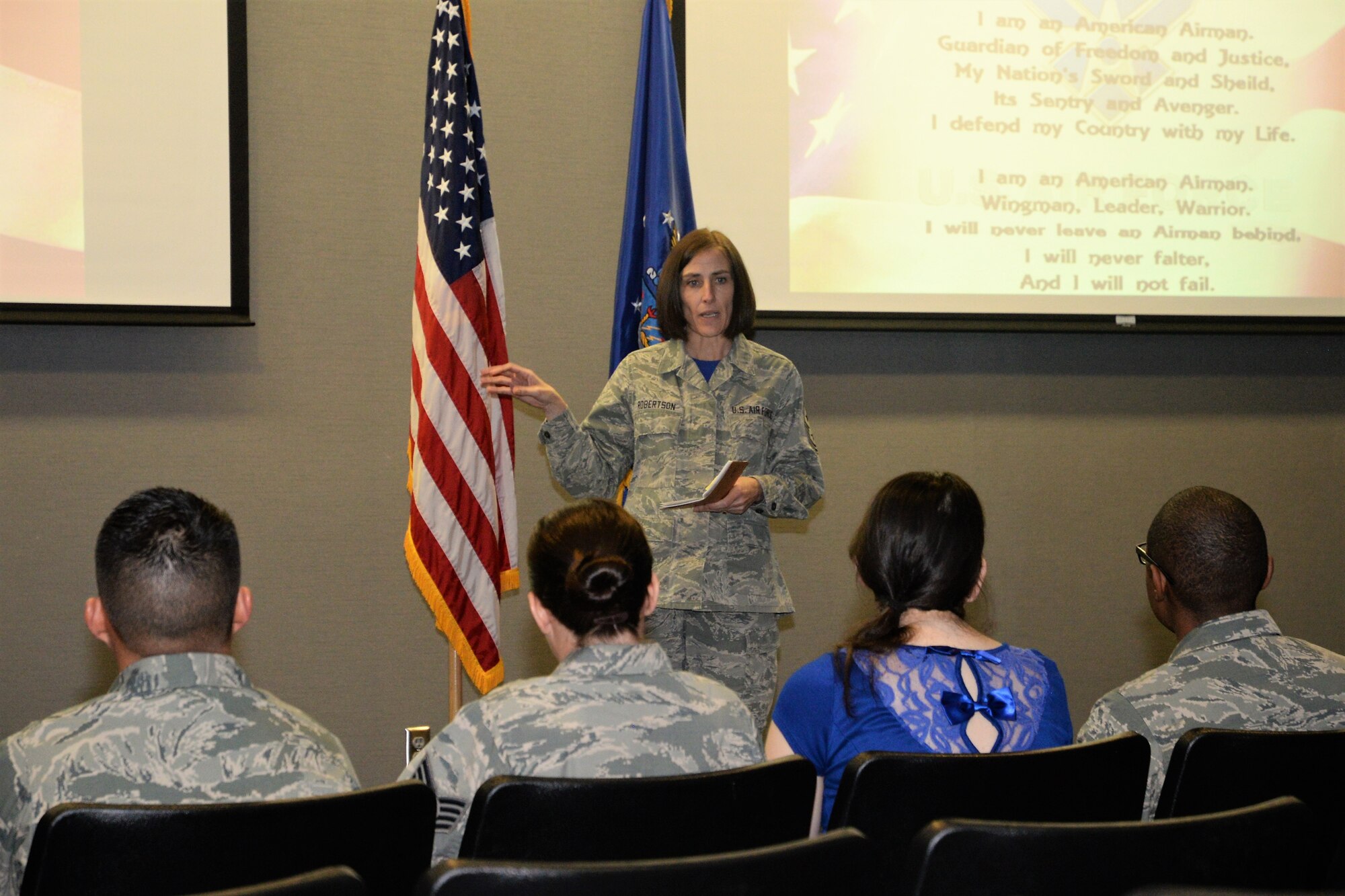 Chief Master Sgt. Vicki Robertson, the 302nd Airlift Wing command chief, addresses the Reserve wing’s newest front-line supervisors during its inaugural NCO Induction Ceremony Jan. 5, 2018, at Peterson Air Force Base, Colo. Robertson emphasized the gravity of entering the NCO tier of the enlisted structure. ”The Airman’s Creed recited today by our newest staff sergeants represents the individual talents, experiences and strengths they each bring to the Air Force,” said Robertson. “They resonate as one voice into a team that will take care of Airmen, perform the mission and leave no one behind." (U.S. Air Force photo/Staff Sgt. Justin Norton)