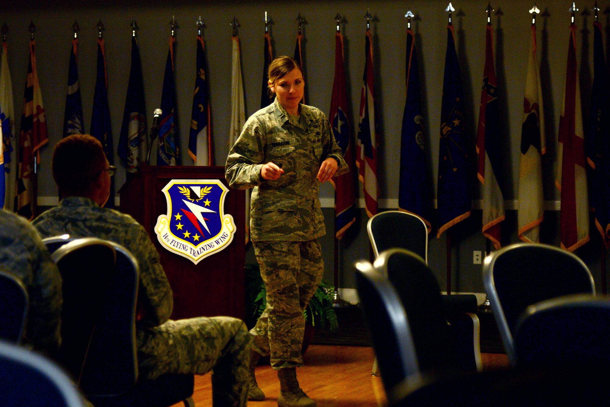First Lt. Hannah Ferrarini, 14th Force Support Squadron Officer in Charge of Career Development, speaks to a full house during Storytellers Jan. 11, 2018, at Columbus Air Force Base, Mississippi. Ferrarini spoke about how she played college soccer but how all that changed after she had a skiing incident which injured her knee. (U.S. Air Force photo by Airman 1st Class Beaux Hebert)
