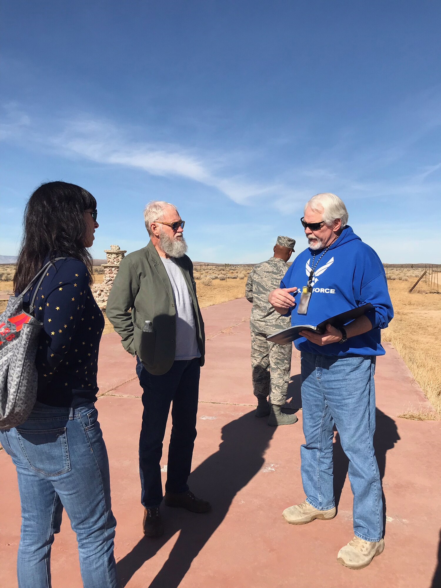 Air Force Flight Test Museum specialist Tony Moore (right) talks about the history of Edwards Air Force Base with television host and comedian David Letterman Jan. 18. (U.S. Air Force photo by Dawn Waldman)