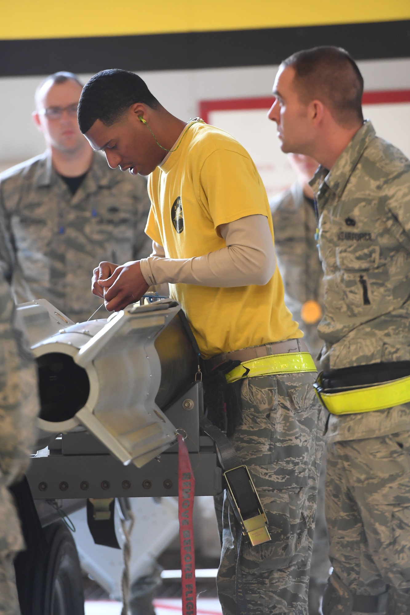 Senior Airman Deshone Davie from the 4th Aircraft Maintenance Unit in the 388th Fighter Wing preps a GBU-12 laser guided bomb during the F-35A weapons loading competition Jan. 19, 2018, at Hill Air Force Base, Utah. These competitions benefit Airmen by honing their specialty skills and bolsters comradery and friendly rivalries. (U.S. Air Force photo by Cynthia Griggs)