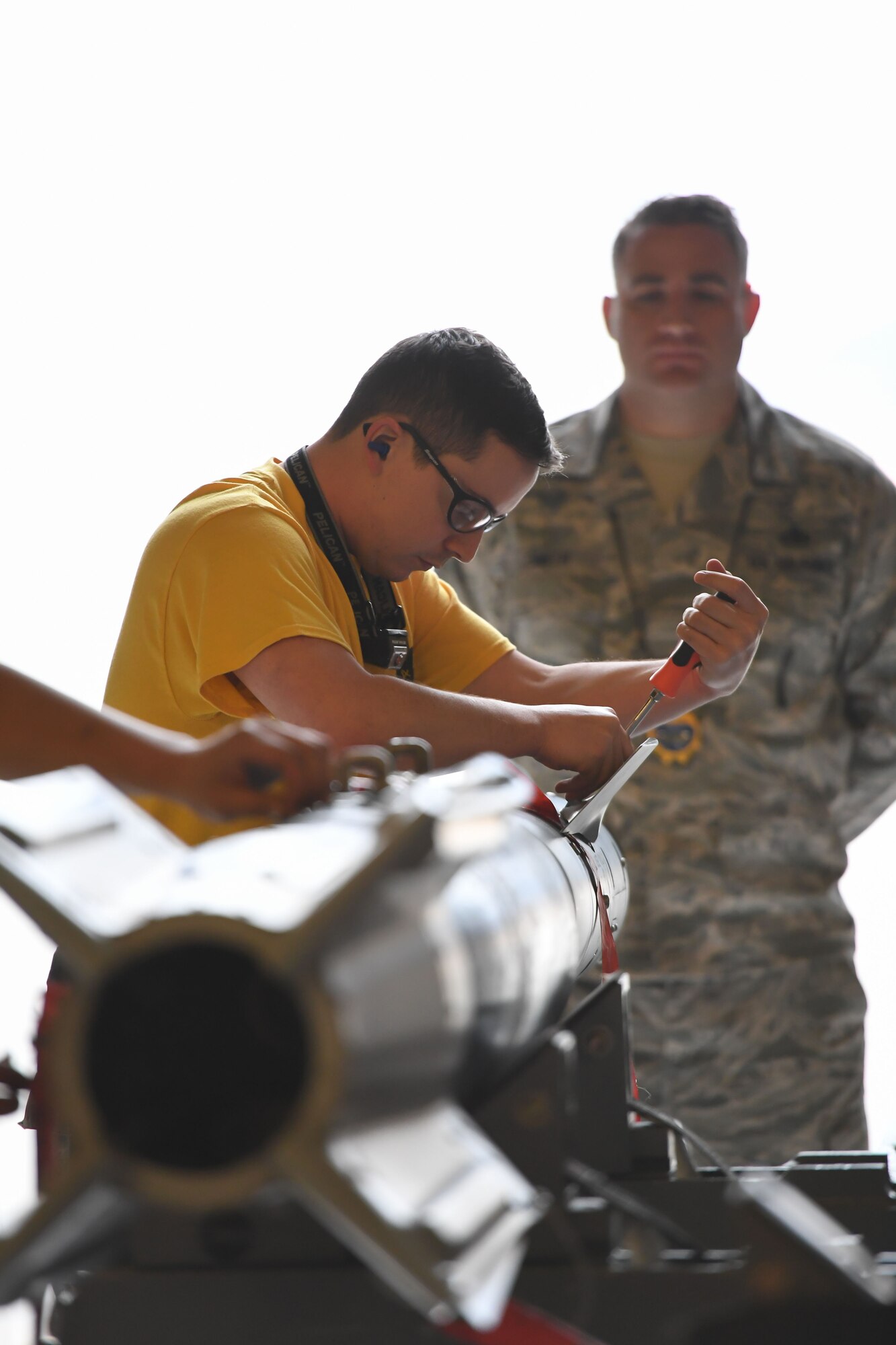 Staff Sgt. Hunter Rivera from the 4th Aircraft Maintenance Unit in the 388th Fighter Wing preps a GBU-12 laser guided bomb during the F-35A weapons loading competition Jan. 19, 2018, at Hill Air Force Base, Utah. These competitions benefit Airmen by honing their specialty skills and bolsters comradery and friendly rivalries. (U.S. Air Force photo by Cynthia Griggs)