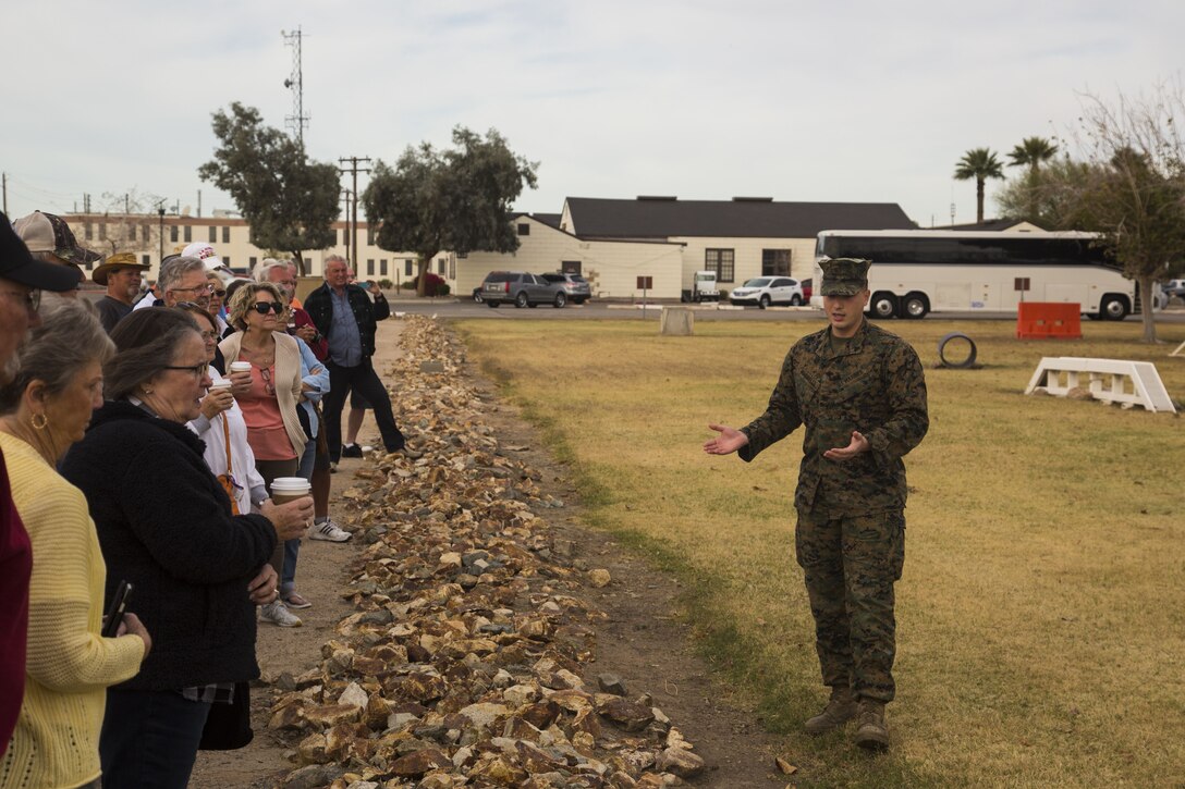 Guests participating in the first Marine Corps Air Station (MCAS) Yuma Winter Tour of the year observe the capabilities of the station, a demonstration of the K-9 unit, and an obstacle course demonstration at various locations on MCAS Yuma, Ariz., Jan. 16, 2017.  The tours have not been conducted for the past two years, but have been resumed by Col. David A. Suggs, the station commanding officer, to build a better relationship with the community. (U.S. Marine Corps photo taken by Cpl. Isaac Martinez)