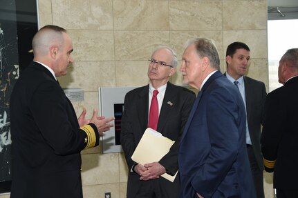 U.S. Navy Vice Adm. Charles Richard (left), deputy commander of U.S. Strategic Command (USSTRATCOM), speaks to Dr. Jeffrey Gold (center), University of Nebraska at Omaha (UNO) chancellor, and Dr. Lou Pol, dean of UNO’s College of Business, during the USSTRATCOM Leadership Fellows Program kickoff at the UNO’s Mammel Hall, Jan. 18, 2018.