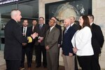 U.S. Navy Vice Adm. Charles Richard (left), deputy commander of U.S. Strategic Command (USSTRATCOM), speaks with fellows program participants during the 2018 USSTRATCOM Strategic Leadership Fellows Program kickoff at University of Nebraska at Omaha’s Mammel Hall, Jan. 18, 2018.