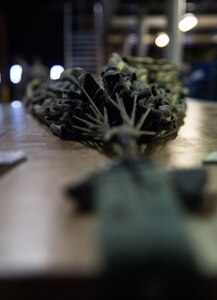 A parachute rests on a table to be packed by the 773d Logistics Readiness Squadron combat mobility flight shop at Joint Base Elmendorf-Richardson, Alaska, Jan. 18, 2018. JBER’s combat mobility flight is the largest in PACAF, providing C-130 Hercules and C-17 Globemaster III unilateral airdrop and airland training for two wings and three squadrons while at home station, as well as all of the airdrop training to Red Flag Alaska.