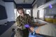 U.S. Air Force Senior Airman Kyleigh Hensley, 380th Expeditionary Medical Group aerospace medical technician, prepares an IV during a photo shoot Jan. 17, 2018, Al Dhafra Air Base, United Arab Emirates. Hensley served as a medical liaison facilitating three host nation medical appointments, six emergency transfers, and three aeromedical evacuations. (U. S. Air Force photo by Airman 1st Class D. Blake Browning)