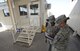 U. S. Air Force Tech. Sgt. Brandi Perryman, 380th Expeditionary Medical Group noncommissioned officer in charge of public health, and U. S. Air Force Senior Airman Erika Battles, 380th EMDG public health technician, review facility inspection results Jan. 18, 2018, Al Dhafra Air Base, United Arab Emirates. The public health office on ADAB ensure the food handlers are following all provisions within the Air Force adopted food code promoting appropriate food handling practices. (U. S. Air Force photo by Airman 1st Class D. Blake Browning)