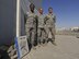 The public health element assigned to the 380th Expeditionary Medical Group poses for a photo outside the public health office Jan. 18, 2018, Al Dhafra Air Base, United Arab Emirates. The public health office performs latrine inspections, food inspections, and animal avoidance prevention as a preventative way to keep the population safe on ADAB. (U. S. Air Force photo by Airman 1st Class D. Blake Browning)