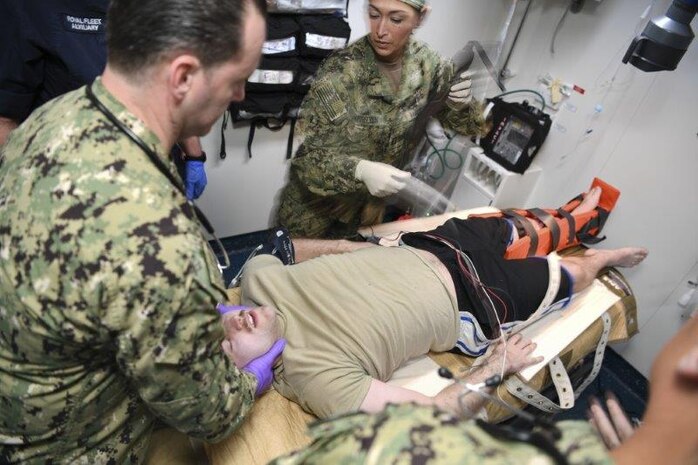 MANAMA, BAHRAIN (Jan. 15, 2018) – Lt. Pamela Resurreccion, right, and Hospital Corpsman 1st Class Raymond Bedard, from Expeditionary Resuscitative Surgical System 19, perform simulated casualty exercises in the medical bay aboard Royal Fleet Auxiliary ship Cardigan Bay during exercise Azraq Serpent 18. (U.S. Navy photo by Mass Communication Specialist 2nd Class Kevin J. Steinberg/ Released)