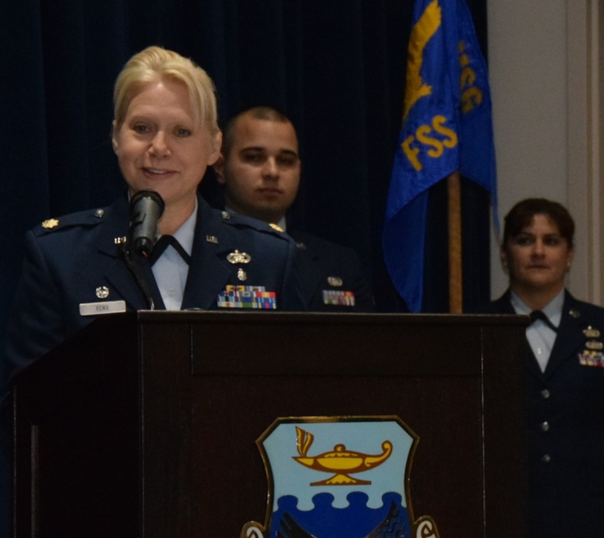 Maj. Robin L. Ecks, 433rd Force Support Squadron commander, speaks to the audience during her assumption of command ceremony held at the Inter American Air Force Academy auditorium Jan. 20, 2018 on Joint Base San Antonio-Lackland, Texas. (U.S. Air Force photo by Tech Sgt. Carlos J. Treviño)
