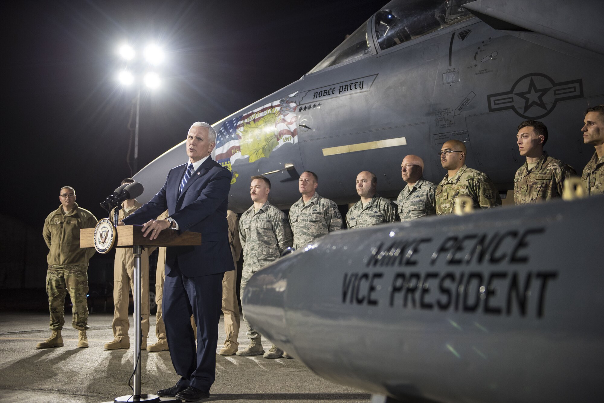 U.S. Vice President Mike Pence addresses the media during a visit at an undisclosed military installation in Southwest Asia, January 21, 2018. Just prior to fielding questions from the press, Pence visited with and recognized members of the 332d Expeditionary Aircraft Maintenance Squadron. (U.S. Air Force photo by Staff Sgt. Joshua Kleinholz)